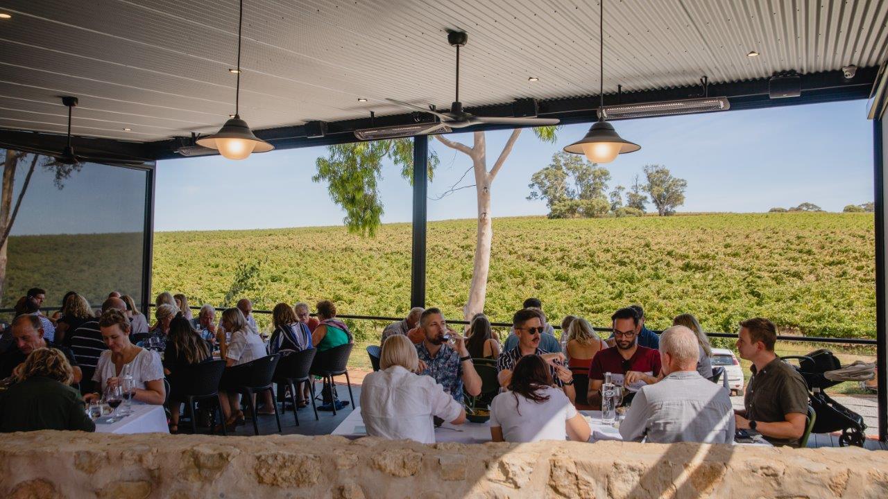 People sitting on tables at restaurant 